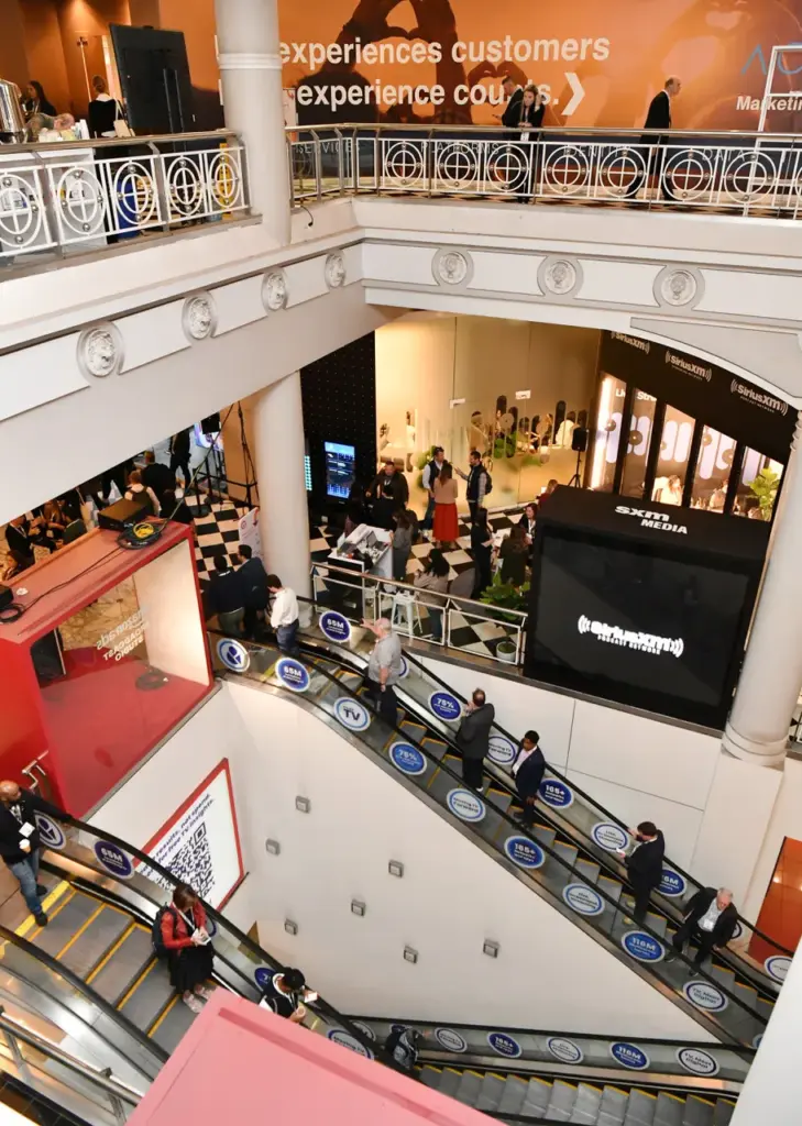 People mill around on several floors of the Penn District headquarters