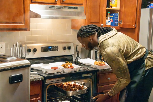 Maryland defensive end Quashon Fuller makes fried chicken and red velvet waffles in his apartment. (Daniel Kraft/Maryland Athletics)